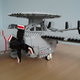 Illustration for article titled Giant LEGO B-1B Bomber Escorted by Fighters, Hawkeye Aircraft